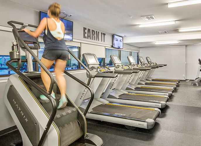 Woman on stair stepper